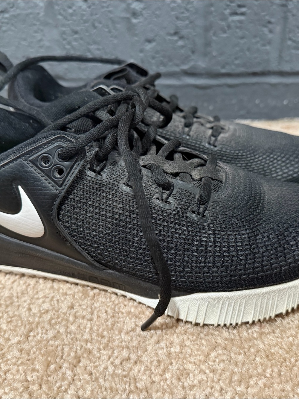 Nike women's Black and White volleyball Athletic Sneakers